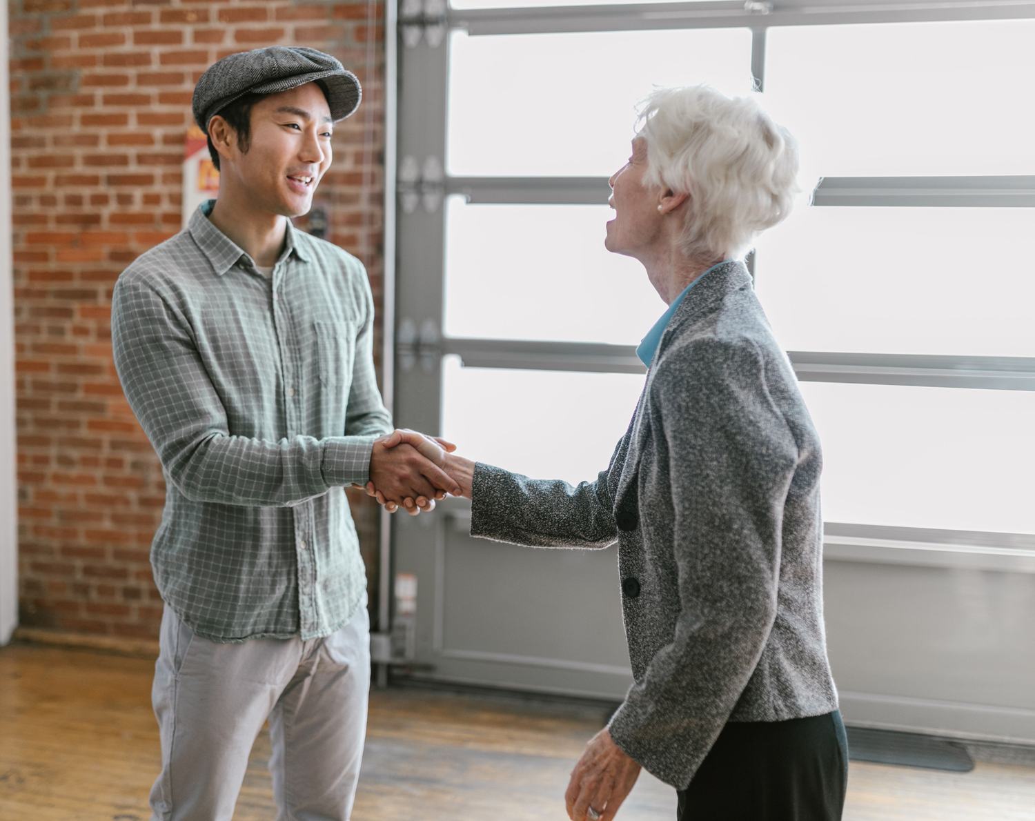 An owner and a younger buyer at work together in a small business